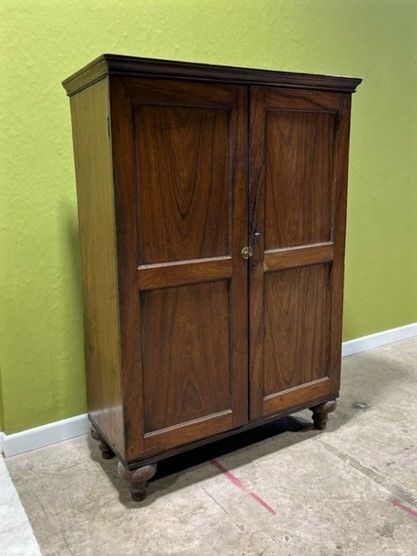 an early 19th century indian rosewood two door cupboard